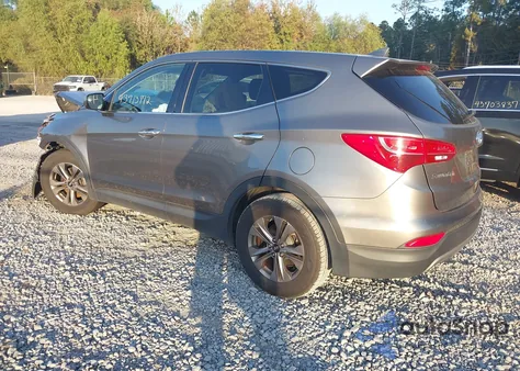 2015 Hyundai Santa Fe Sport 2.4L z USA, uszkodzony, nr VIN 5XYZTDLB4FG266918